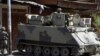 Soldiers deployed at Syria street, which divides Sunni and Alawite areas of Tripoli, Lebanon, June 3, 2012.