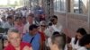Residents line up to receive yellow fever vaccinations in Clorinda, Argentina on Feb. 20, 2008, after cases of the disease were reported near the capital, Asuncion.