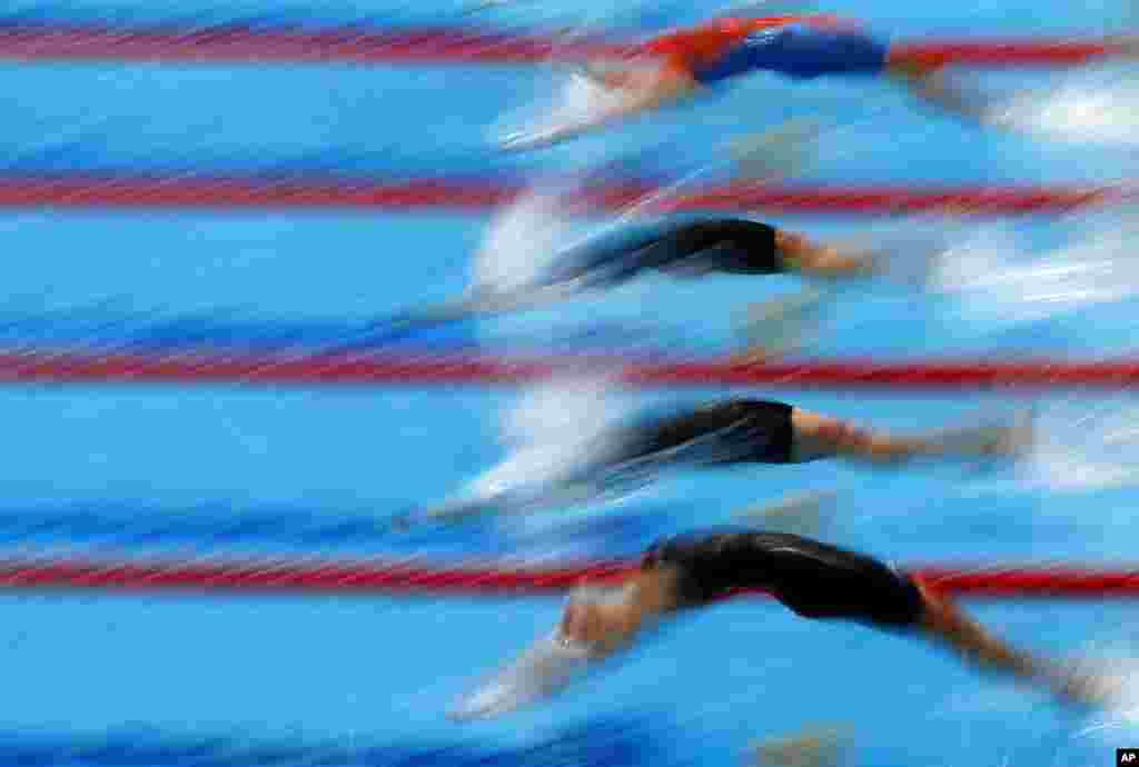 Athletes start into the women&#39;s 50-meter breaststroke preliminaries at the European Aquatics Championships in Duna Arena in Budapest, Hungary.