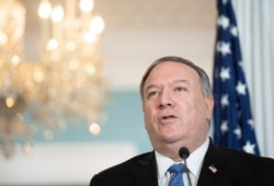 FILE - Secretary of State Mike Pompeo speaks to the media at the State Department, in Washington, Nov. 24, 2020.