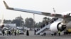 Des passagers arrivent à l'aéroport de Mitiga, Tripoli, Libye, le 20 janvier 2018.
