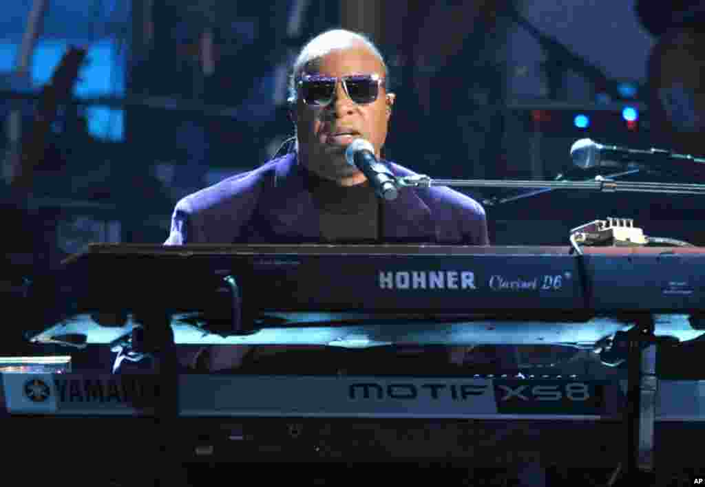 Stevie Wonder and the Rickey Minor Band perform “Master Blaster”, “My Cherie Amour” and “Sir Duke” as a tribute to Dick Clark at the 40th Anniversary American Music Awards on Nov. 18, 2012, in Los Angeles.