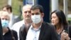 FILE PHOTO: Al Jazeera senior producer Drew Ambrose leaves Bukit Man police headquarters after being questioned by the Malaysian police over a documentary on the country’s arrests of undocumented migrants, in Kuala Lumpur