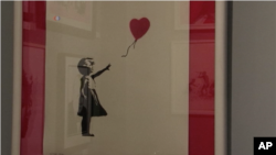 « دختر با بادکنک» اثر بنکسی Girl with Balloon