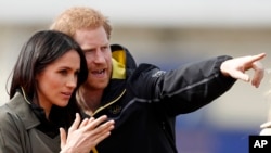 Pangeran Harry dan Meghan Markle (foto: ilustrasi). 