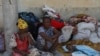Des réfugiés de la région du Tigray en Éthiopie attendent de s’enregistrer au centre du HCR à Hamdayet, au Soudan, le samedi 14 novembre 2020. 