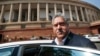 FILE - Indian business tycoon Vijay Mallya gets into his car outside the Parliament in New Delhi, India, Feb. 27, 2013.