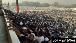 Jalalabad Pakistani Visa seekers at football stadium
