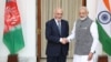 Afghan President Ashraf Ghani, left, and Indian Prime Minister Narendra Modi shake hands before the start of their official meeting in New Delhi, Oct. 24, 2017.