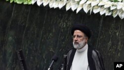 President Ebrahim Raisi delivers a speech after taking his oath as president in a ceremony at the parliament in Tehran, Iran, Thursday, Aug. 5, 2021. The inauguration of Raisi, a protégé of Iran's supreme leader, completes hard-liners' dominance of…