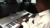 Hailu Mergia, an Ethiopian taxi driver and musician, living in Washington, D.C.