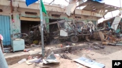 The wreckage of a bus remains at the site of an airstrike in Saada, Yemen, on Aug. 10, 2018.