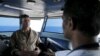 FILE - U.S. Navy Rear Admiral Andrew Lewis speaks during an interview on the bridge of the USS Theodore Roosevelt (CVN-71) aircraft carrier.
