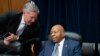 House Oversight Committee Chairman Elijah Cummings, D-Md., center, has a word with Rep. Mark Meadows, R-N.C., just after the panel voted 24-15 to hold Attorney General William Barr and Commerce Secretary Wilbur Ross in contempt, on Capitol Hill in Washington, June 12, 2019.