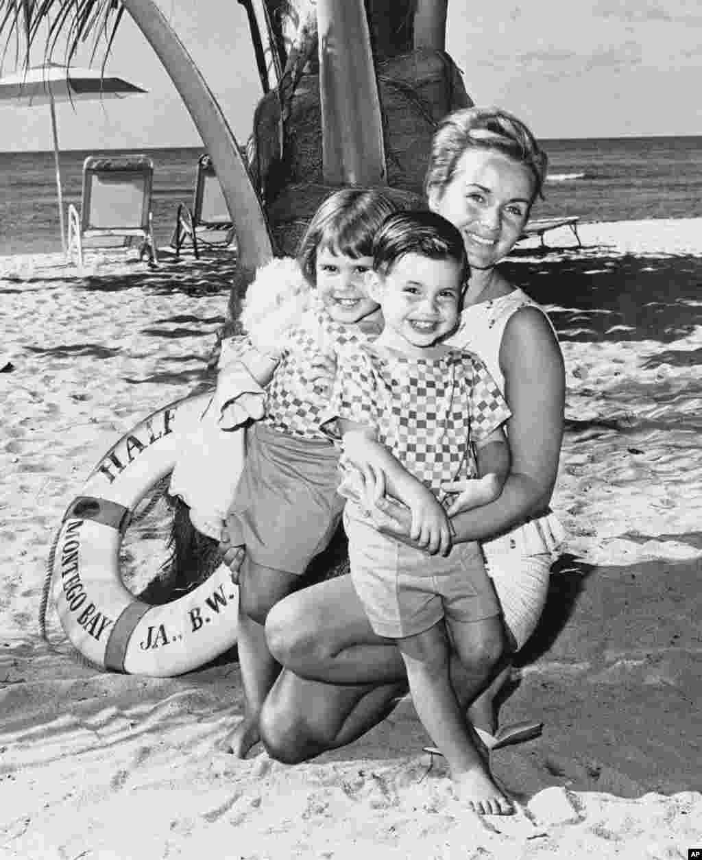 Actress Debbie Reynolds spends a two-week vacation at the Half Moon Hotel in Montego Bay, Jamaica, Jan. 26, 1961, accompanied by her children, Carrie and Todd.