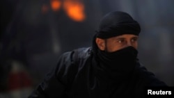 A fighter from the Islamist Syrian rebel group Jabhat al-Nusra (file photo)