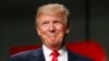 US Republican Presidential nominee Donald Trump addresses supporters at Macomb Community College on Oct. 31, 2016 in Warren, Michigan.