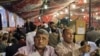Electoral workers count ballots at a counting center, after polls closed in the Abdeen neighborhood of Cairo, Egypt, 28 Nov 2010