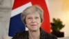 Theresa May lors d'une réunion à 10 Downing Street à Londres, le 24 juillet 2018.