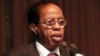 Somalia's former Prime Minister Nur Hussein Hassan speaks during the opening ceremony of peace talks between Somalia's opposition Alliance for the Re-Liberation of Somalia (ARS) and the government in Djibouti, Jan. 25, 2009. 