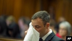 Oscar Pistorius le champion paralympique sud-africain condamné pour le meurtre de sa petite amie, Pretoria, Afrique du Sud, 17 octobre 2014.