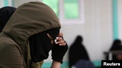Rawan Aboud, the wife of an Islamic State militant, is pictured at al-Hol displacement camp in Hasaka governorate, Syria, April 1, 2019.