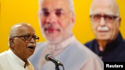 Three senior leaders of India's ruling Bharatiya Janata Party (BJP), including Lal Krishna Advani, are charged with criminal conspiracy in connection with the demolition of a 16th century mosque 25 years ago.