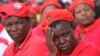 Women listen to political address by the head of the opposition Movement for Democratic Change in Harare, May, 19, 2013.