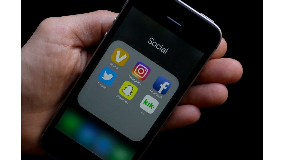 FILE - Some social media apps on a smartphone.