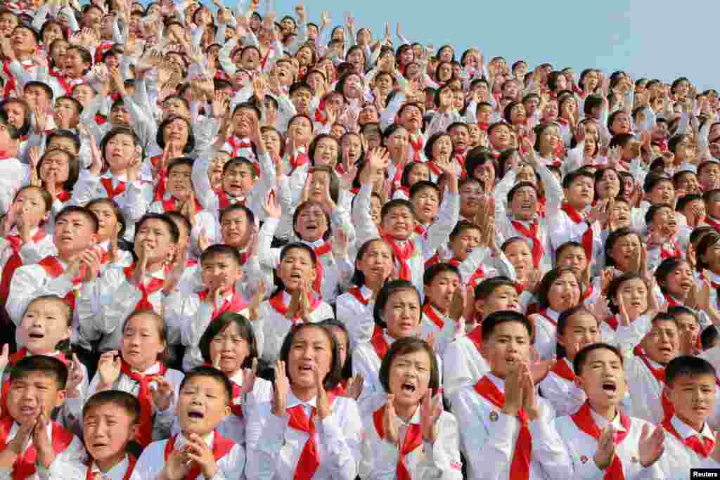 Schoolchildren cheer as North Korean leader Kim Jong Un arrives to attend "We Are the Happiest in the World", a performance of schoolchildren to celebrate the 70th founding anniversary of the Korean Children's Union (KCU) in Pyongyang.