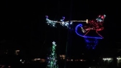 Parade of Boats Glitter With Festive Holiday Lights