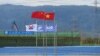 Cờ Trung Quốc đã tung bay ở Vĩnh Tân, và sắp tới là Cà Ná? Ảnh: Lê Anh Hùng