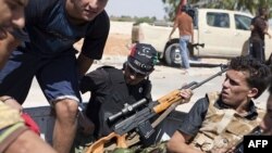 Müəmmər Qəzzafi Liviya xalqını "ölkəni azad etməyə" çağırıb