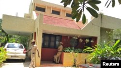 Police stand guard at the house of Gauri Lankesh, a senior Indian journalist who according to police was shot dead on Tuesday by unidentified assailants, in Bengaluru, India, September 6, 2017.