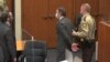 Former Minneapolis police officer Derek Chauvin is led away in handcuffs after a jury found him guilty of all charges in his trial for murder in the death of George Floyd in Minneapolis, Minnesota, April 20, 2021.