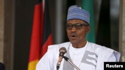 FILE - Writers, intellectuals and media figures said in a letter to Nigerian President Muhammadu Buhari, pictured in February 2016, that they saw "a disturbing trend" that suggests "an attempt to criminalize the important work that journalists in Nigeria do."