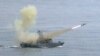 FILE - A Taiwanese navy frigate launches a 'Harpoon' surface-to-surface missile May 16, 2007, during the second day of the annual Hankuang military exercises off Ilan, central eastern coast of Taiwan.