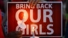 People participate in a "Bring Back Our Girls" campaign demonstration and candlelight vigil, held on Mother's Day in Los Angeles, May 11, 2014.