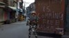 An Indian paramilitary soldier stands guard during curfew in Srinagar, Indian controlled Kashmir, Sept. 13, 2016.