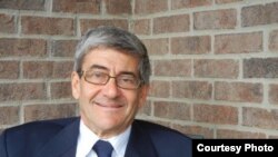 Dr. Josef Olmert