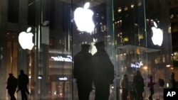 FILE - Law enforcement can get data from the phone that has been backed up by the company’s cloud service, but Apple’s encryption means data that lives only on a person’s phone can only be accessed by someone with the person’s passcode.