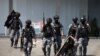 Thai security forces leave the Terminal 21 mall after completing their mission to stop a soldier on a rampage after a mass shooting, Nakhon Ratchasima, Thailand February 9, 2020. REUTERS/Athit Perawongmetha