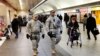 Members of the New York National Guard patrol Penn Station, March 22, 2016, in New York. 