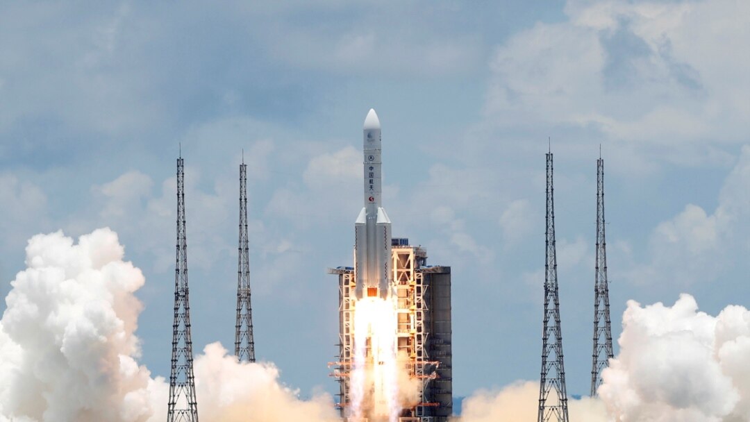 FILE - The Long March 5 Y-4 rocket, carrying an unmanned Mars probe of the Tianwen-1 mission, takes off from Wenchang Space Launch Center in Wenchang, Hainan Province, China, July 23, 2020.