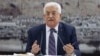 FILE- Palestinian President Mahmoud Abbas talks during a leadership meeting in Ramallah, April 1, 2014