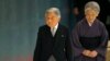 FILE - Japan's Emperor Akihito, accompanied by Empress Michiko, leaves after delivering his remarks during a memorial service at Nippon Budokan martial arts hall in Tokyo, Aug. 15, 2015. 