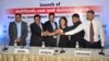 Chandra Bhan Prasad (second from right) at a function to launch Dalit Foods, which he hopes will help to end caste-based discrimination, New Delhi, July 2, 2016. (Courtesy photo from Dalit Foods)