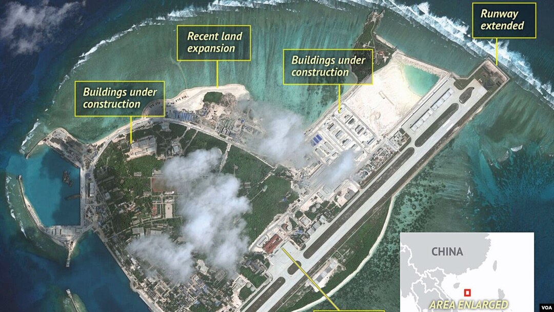 Satellite imagery analysis by geopolitical intelligence firm Stratfor shows overall land, building and military expansion by China on Woody Island in the South China Sea. (Courtesy of Stratfor)