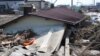 The 2011 quake and resulting tsunami waves killed an estimated 18,000 people and triggered the meltdowns of three nuclear reactors in Fukushima, Japan. (S. Herman/VOA)