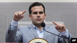 FILE - Puerto Rico Gov. Ricardo Rossello speaks during a press conference in San Juan, Puerto Rico, Aug. 28, 2018. 